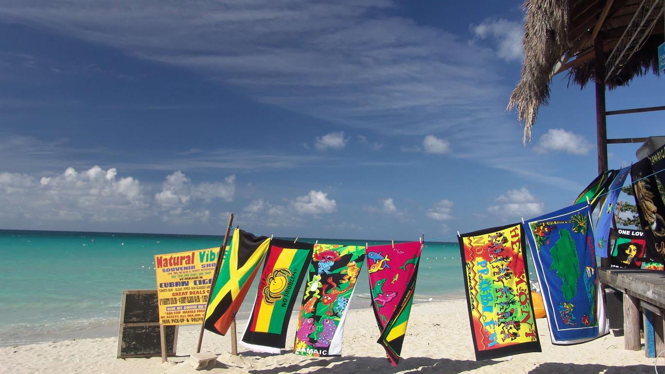 Strand met handdoeken op Jamaica
